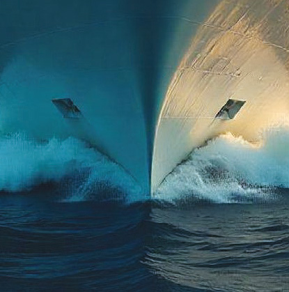 The ship cuts through the waves